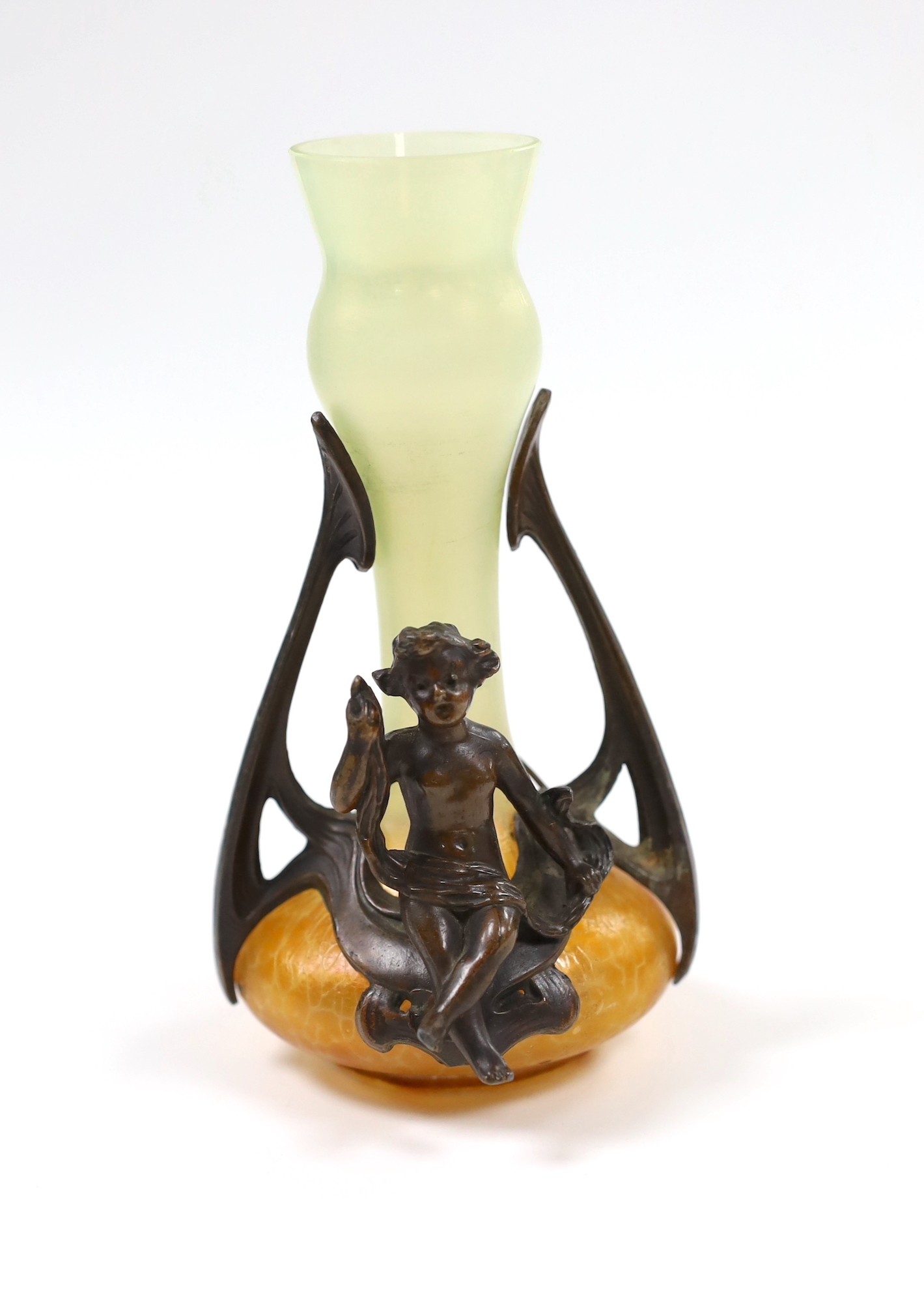 A small Art Nouveau glass vase with bronze mount and seated cherub, 16cm tall